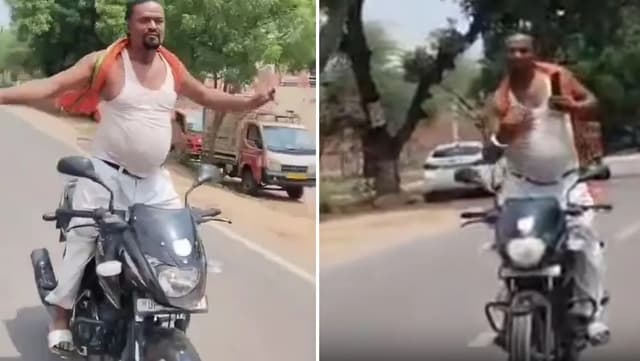 चलती बाइक पर खड़े होकर युवक कर रहा डांस, वायरल वीडियो देख गुस्से में लोग